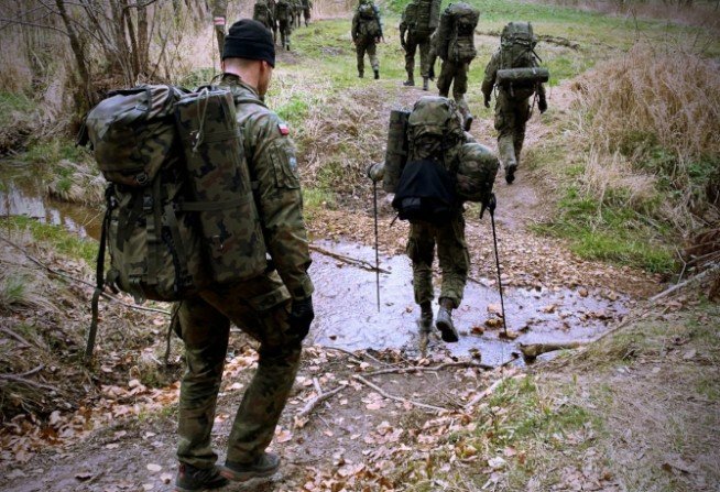 Żołnierze na szlaku
Fot. Źr&oacute;dło: 1WBPanc